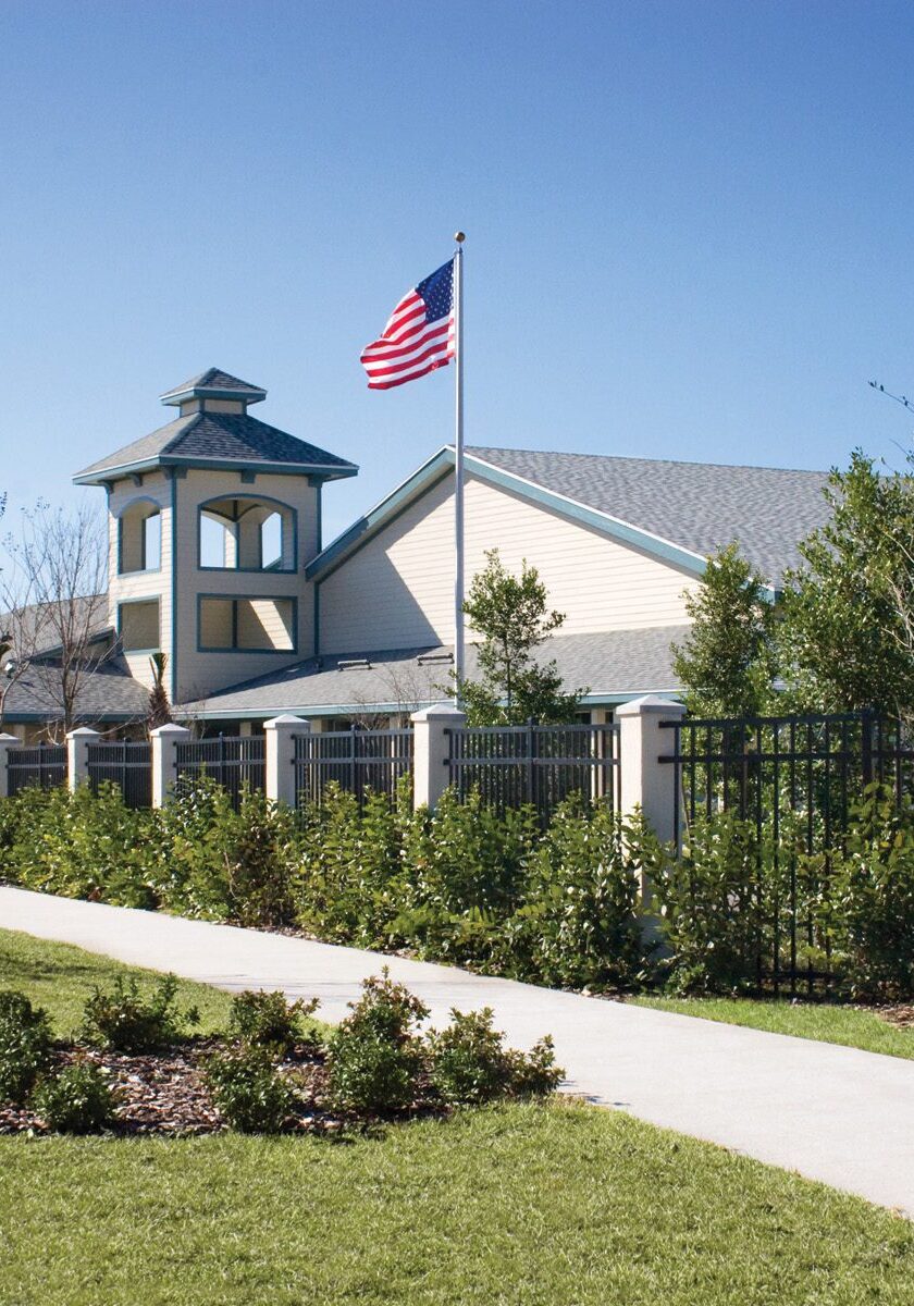 Charter School in Florida with Landscaping and American Flag Flying.
